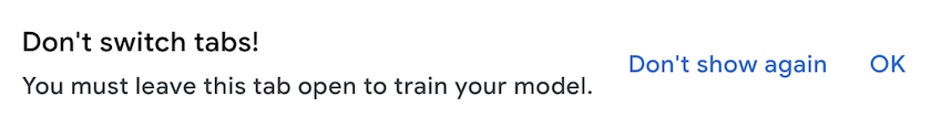 Pop-up browser notification is displayed stating not to switch tabs. There is an option to click OK or not show message again